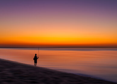 [adamski] Atardecer pescador en la playa